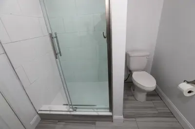 a bathroom with a shower and a toilet at Downtown Easton in Easton