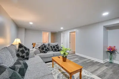 a living room with a couch and a table at Deck and Grill Convenient Home in Hummelstown in Hummelstown