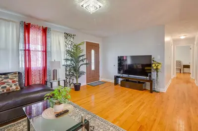 a living room with a couch and a television at Deck and Grill Convenient Home in Hummelstown in Hummelstown