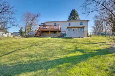 a house with a large yard in front of it at Deck and Grill Convenient Home in Hummelstown in Hummelstown