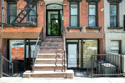 a set of stairs leading to a building at E Village Studio w renovated virtual doorman NYC-316 in New York