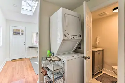 a kitchen with a washer and dryer at Philadelphia Home Rental Near Center City! in Philadelphia