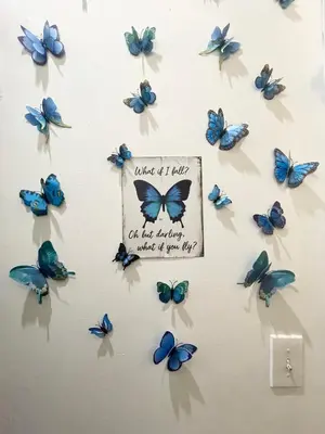 a group of butterflies hanging on a wall at Beautiful and spacious apartment in Times Square! in New York