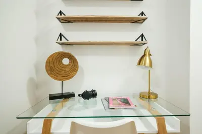 a glass table with a chair and a lamp at 74-4A 2BR 2baths in Prime Upper West Side w d GYM in New York