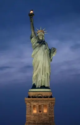 an image of the statue of liberty at night at New York City Private Bedroom Near The Free Ferry Boat! in Stapleton