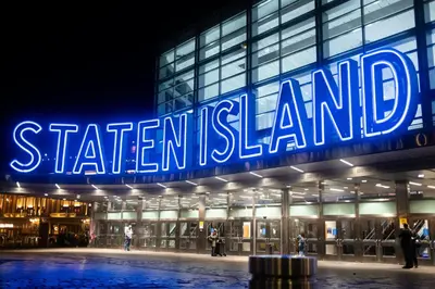 a building with a sign that reads southern island at New York City Private Bedroom Near The Free Ferry Boat! in Stapleton