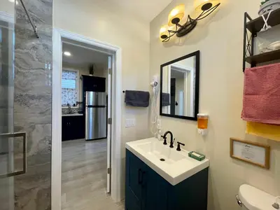 a bathroom with a sink and a mirror at New York City Private Bedroom Near The Free Ferry Boat! in Stapleton