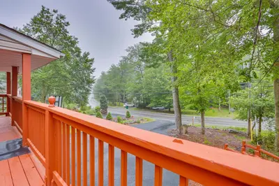 a view from the deck of a home at Pocono Vacation Rental with Game Room! in Tobyhanna