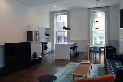 a living room with a couch and a table at Stay Rafa At 2000 Spruce in Philadelphia