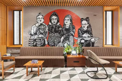 a mural of people on a wall in a room at UNTITLED at 3 Freeman Alley in New York