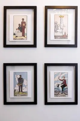 a group of framed pictures hanging on a wall at Thena Hotel- Lux Studio in Philadelphia
