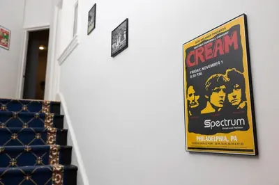 a poster for a movie on a wall at Thena Hotel - Spacious 1 Bedroom - City Center in Philadelphia