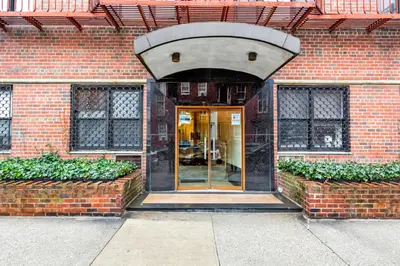 a entrance to a brick building with a glass door at W Village 1BR w Elevator WD nr subway NYC-762 in New York