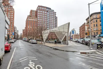 a street with cars parked on a city street at W Village 1BR w Elevator WD nr subway NYC-762 in New York