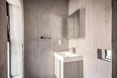 a bathroom with a white sink and a mirror at East Village 1br w wd nr Union Sq NYC-936 in New York