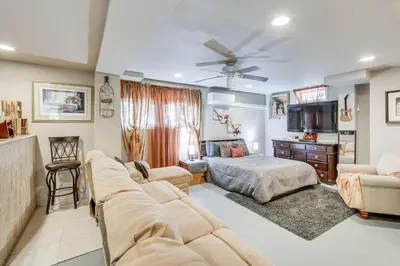 a living room with a couch and a bed at 3 Mi to Lake Redman Home with Furnished Pergola! in York
