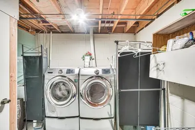 a washer and dryer in a laundry room at 3 Mi to Lake Redman Home with Furnished Pergola! in York