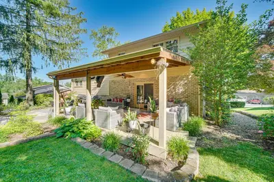 a house with a pavilion on the front yard at 3 Mi to Lake Redman Home with Furnished Pergola! in York