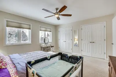 a bedroom with a bed and a ceiling fan at Wilmington Vacation Rental Less Than 2 Mi to Downtown! in Wilmington