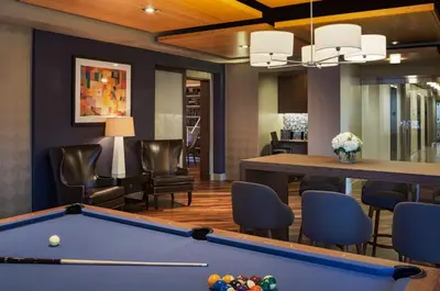 a billiard room with a pool table at Global Luxury Suites at The Marc in New York