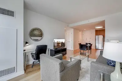 a living room with a couch and a table at Global Luxury Suites at Via 57 in New York