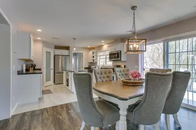 a kitchen and dining room with a table and chairs at Walk to Lake Wallenpaupack Poconos Vacation Home in Lake Ariel