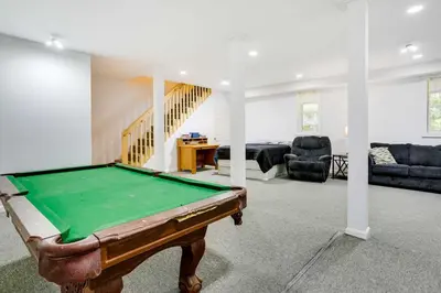 a pool table in the middle of a living room at Walk to Lake Wallenpaupack Poconos Vacation Home in Lake Ariel