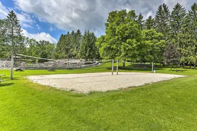 an empty volleyball court in a park at Walk to Lake Wallenpaupack Poconos Vacation Home in Lake Ariel